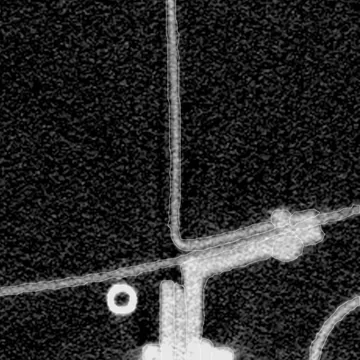 A frame junction, a small ring and the edge of the pressure bottle in the airframe scan, each part traced by its published outline.